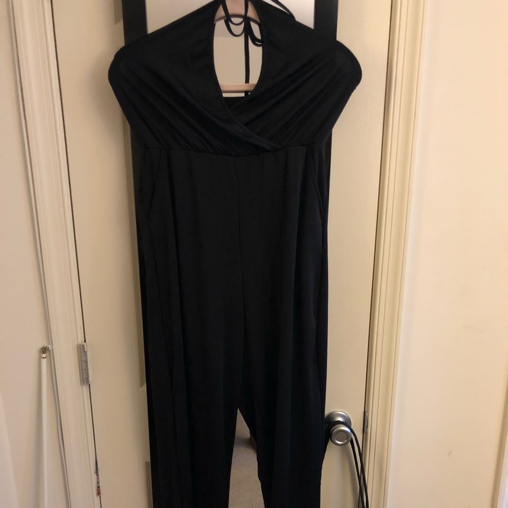 One piece holter top jumper. Gathers at the ankle